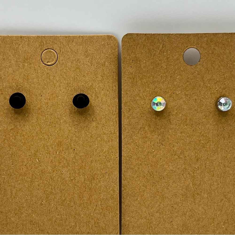 Diamond shaped pairs of stud earrings